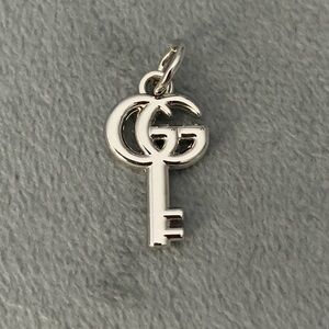 Elegant Silver Key Pendant